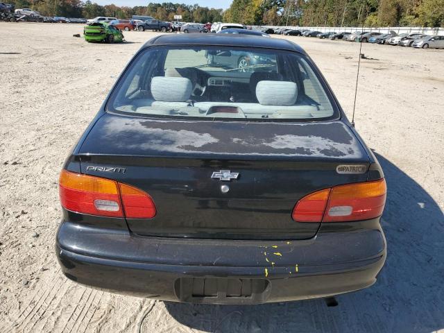 1Y1SK54842Z424727 - 2002 CHEVROLET GEO PRIZM BASE BLACK photo 6