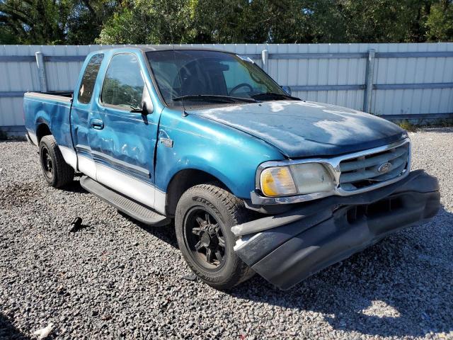 1FTZX1725YNA46602 - 2000 FORD F150 GREEN photo 4