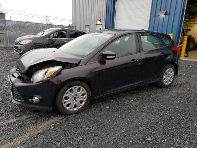 1FAHP3K24CL364445 - 2012 FORD FOCUS SE BLACK photo 1