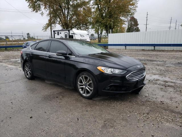 3FA6P0H75HR219755 - 2017 FORD FUSION SE BLACK photo 4