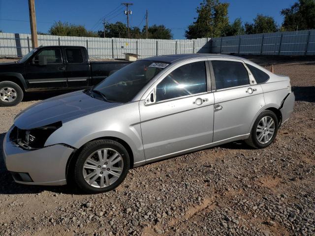 1FAHP3HNXAW199871 - 2010 FORD FOCUS SEL SILVER photo 1