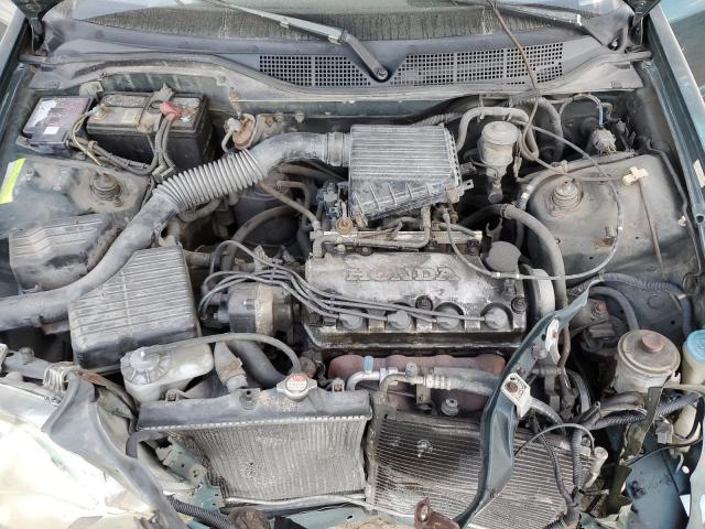 2HGEJ6614XH579815 - 1999 HONDA CIVIC BASE GREEN photo 11