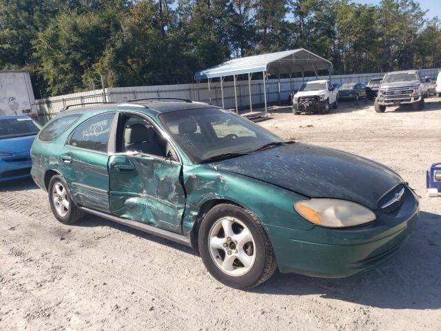 1FAFP58U2YA111302 - 2000 FORD TAURUS SE GREEN photo 4