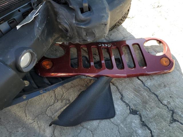 1J4GA5D12AL107119 - 2010 JEEP WRANGLER SAHARA RED photo 13