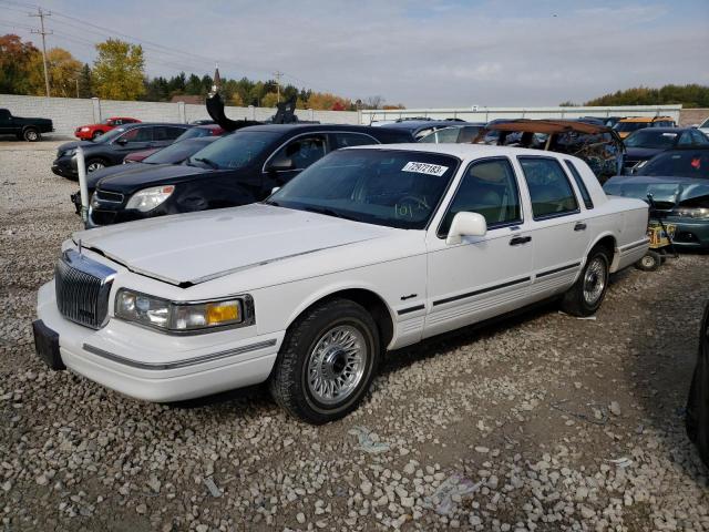 1LNLM82WXVY752472 - 1997 LINCOLN TOWN CAR SIGNATURE WHITE photo 1