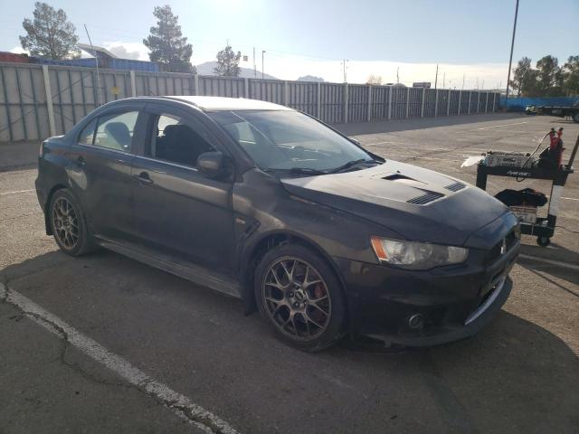 JA32W5FV5BU036915 - 2011 MITSUBISHI LANCER EVO CHARCOAL photo 4