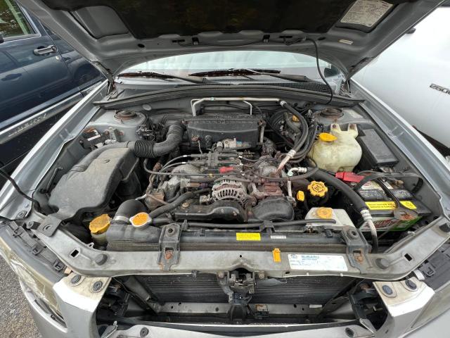 JF1SG65694H720897 - 2004 SUBARU FORESTER 2.5XS Серебристый фото 7