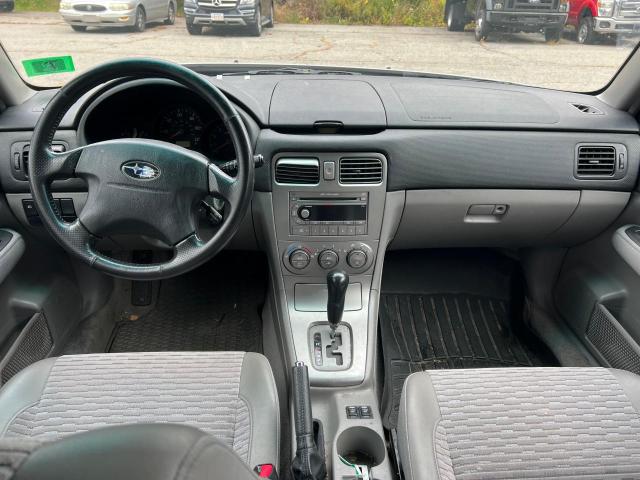JF1SG65694H720897 - 2004 SUBARU FORESTER 2.5XS Серебристый фото 9