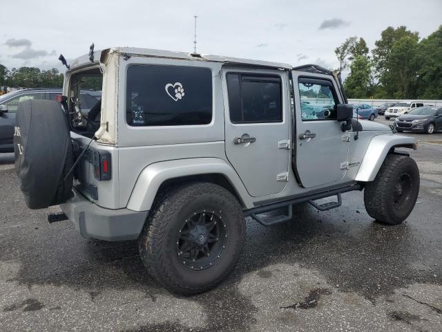 1J4BA5H14BL554640 - 2011 JEEP WRANGLER U SAHARA SILVER photo 3