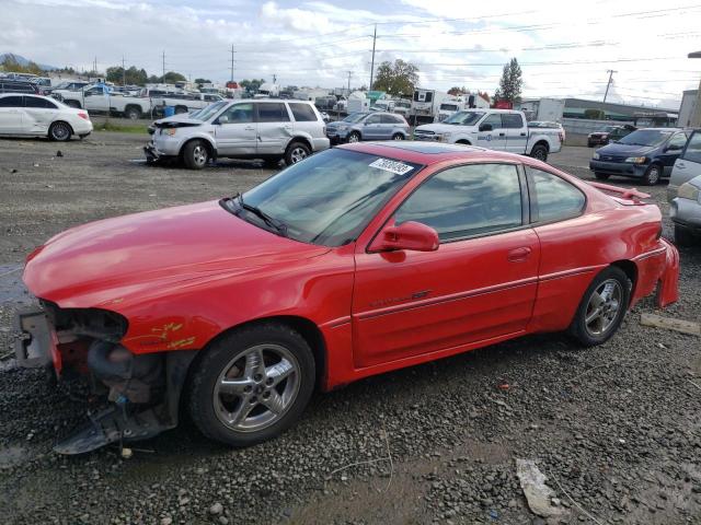 1G2NV12E11M574613 - 2001 PONTIAC GRAND AM GT1 RED photo 1