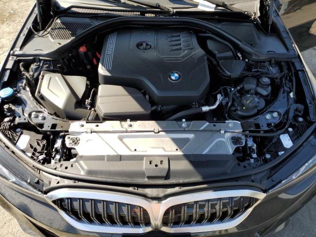 3MW89FF00R8E66739 - 2024 BMW 330XI Schwarz Foto 11