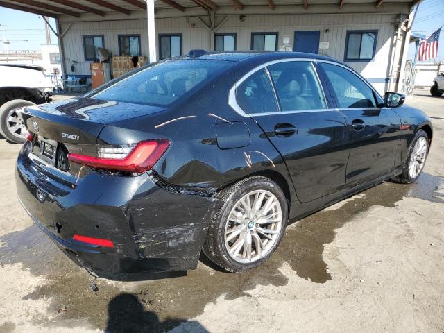 3MW89FF00R8E66739 - 2024 BMW 330XI Schwarz Foto 3