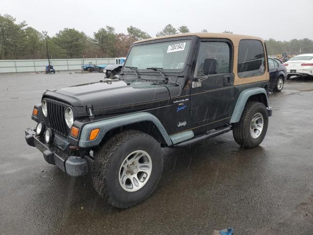 1J4FY19S1WP749946 - 1999 JEEP WRANG SPORT BLACK photo 1