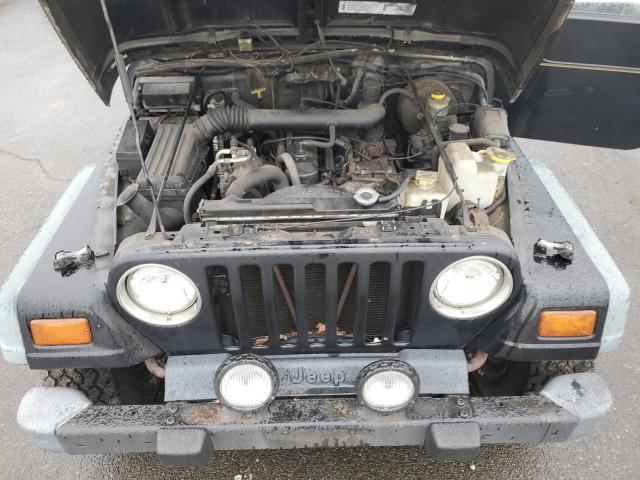 1J4FY19S1WP749946 - 1999 JEEP WRANG SPORT BLACK photo 12