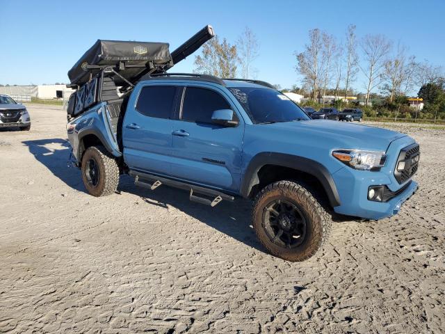 3TMCZ5AN4KM242235 - 2019 TOYOTA TACOMA DOUBLE CAB BLUE photo 4