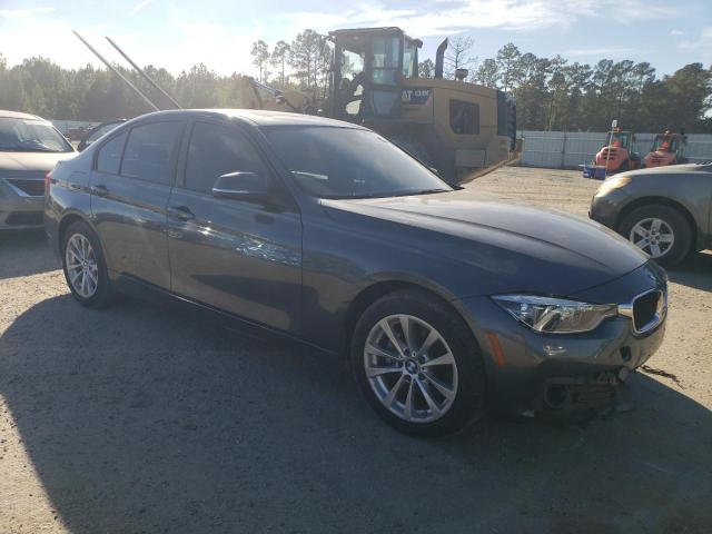 WBA8E5G50JNV02348 - 2018 BMW 320 XI GRAY photo 4