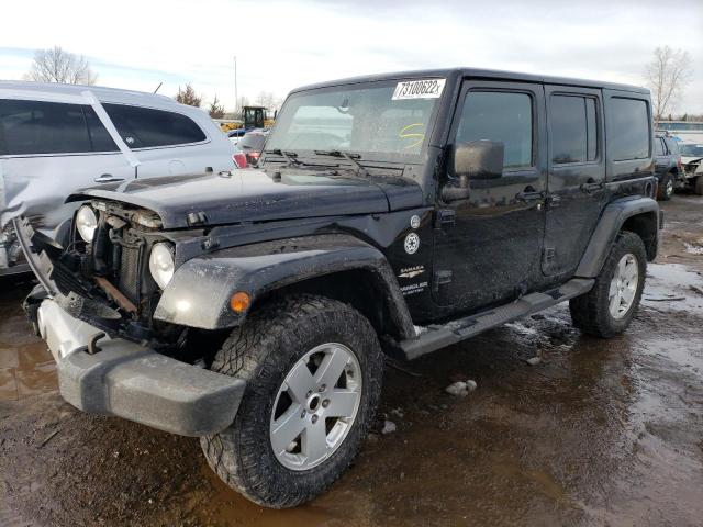 1J4BA5H16BL636322 - 2011 JEEP WRANGLER U SAHARA BLACK photo 1