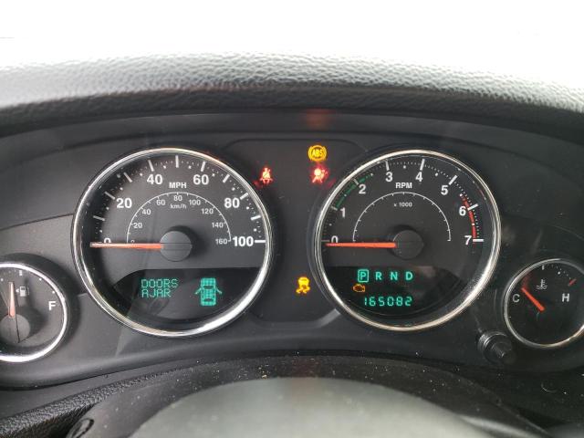 1J4BA5H16BL636322 - 2011 JEEP WRANGLER U SAHARA BLACK photo 9