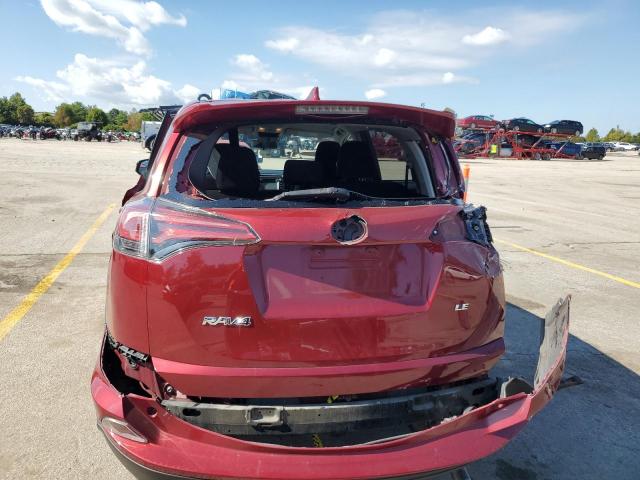 2T3ZFREV0JW472291 - 2018 TOYOTA RAV4 LE RED photo 6