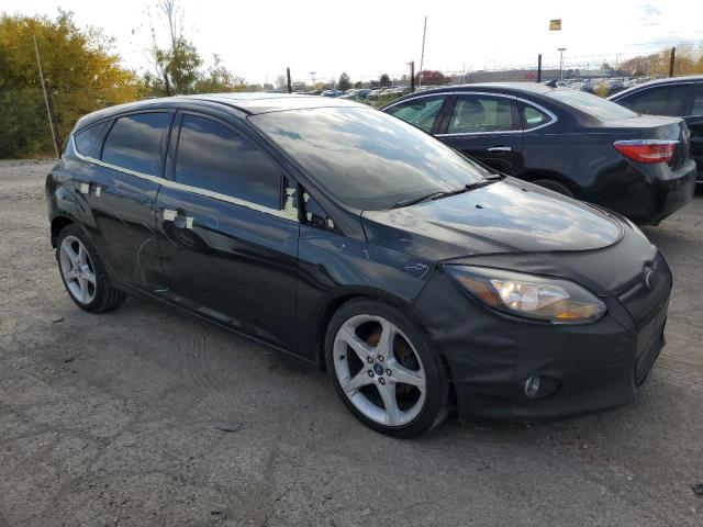 1FAHP3N22CL111149 - 2012 FORD FOCUS TITANIUM BLACK photo 4