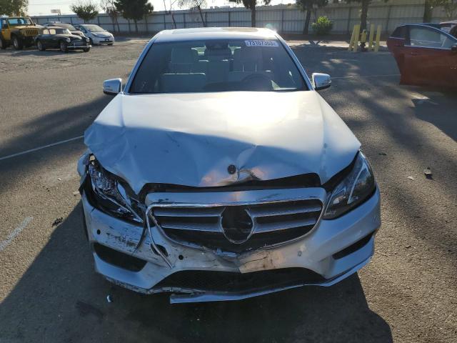 WDDHF0EB0EA877901 - 2014 MERCEDES-BENZ E 250 BLUETEC BLUE photo 5