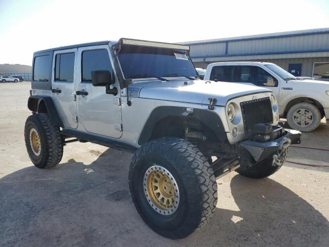 1J4BA3H15BL512630 - 2011 JEEP WRANGLER U SPORT SILVER photo 4