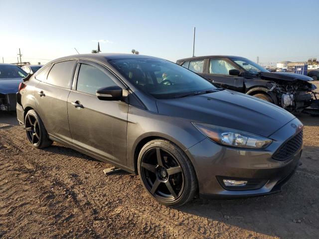 1FADP3F27FL348639 - 2015 FORD FOCUS SE GRAY photo 4