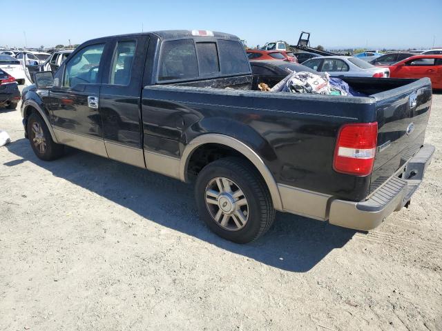1FTPX12524NC49269 - 2004 FORD F150 Қара фото 2