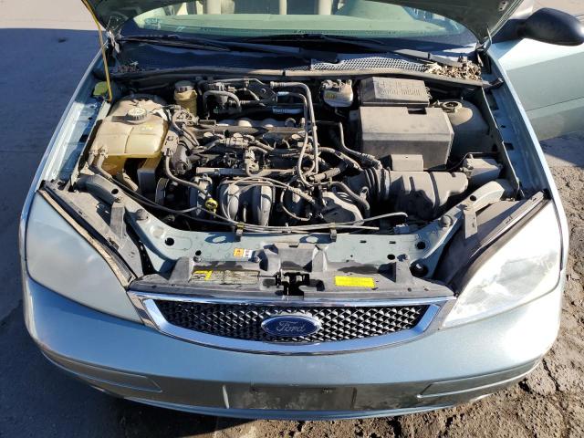 1FAFP34N25W249729 - 2005 FORD FOCUS ZX4 TURQUOISE photo 11