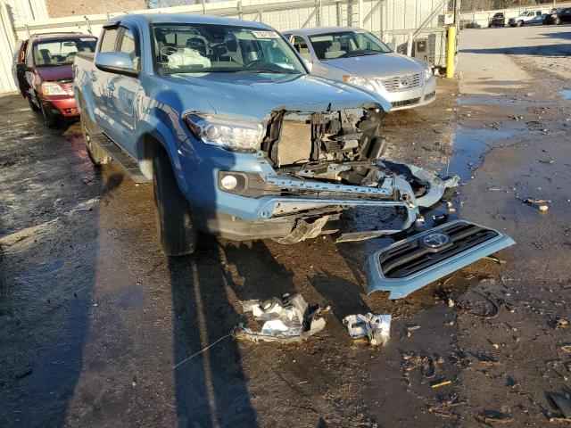 3TMAZ5CN7KM083411 - 2019 TOYOTA TACOMA DOU BLUE photo 4