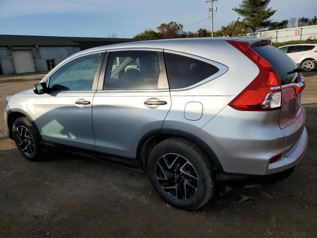 2HKRM4H48GH620456 - 2016 HONDA CR-V SE SILVER photo 2