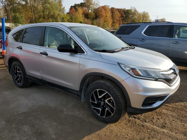 2HKRM4H48GH620456 - 2016 HONDA CR-V SE SILVER photo 4