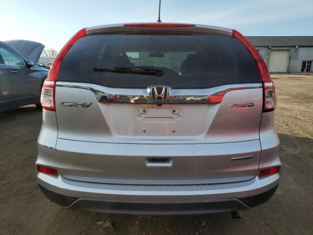 2HKRM4H48GH620456 - 2016 HONDA CR-V SE SILVER photo 6