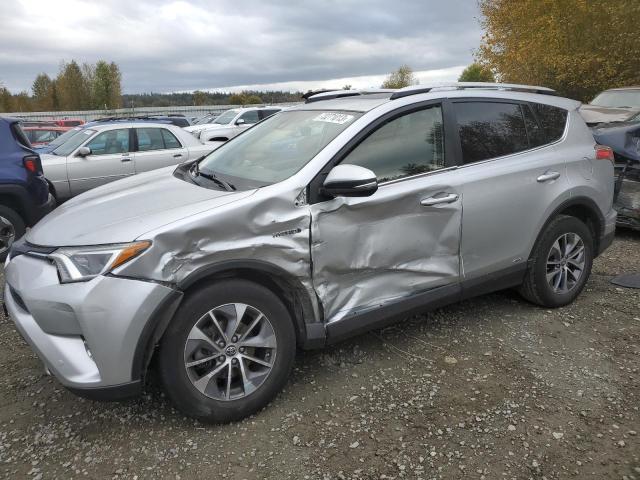 JTMRJREV2GD006656 - 2016 TOYOTA RAV4 HV XLE SILVER photo 1