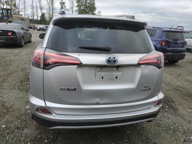 JTMRJREV2GD006656 - 2016 TOYOTA RAV4 HV XLE SILVER photo 6