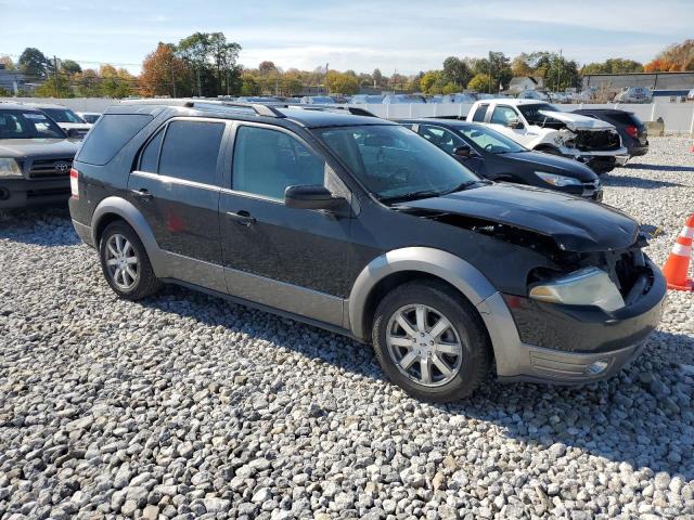 1FMDK02W98GA43330 - 2008 FORD TAURUS X SEL BLACK photo 4