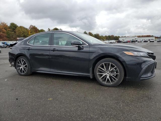 4T1T11BK4PU098799 - 2023 TOYOTA CAMRY SE NIGHT SHADE BLACK photo 4