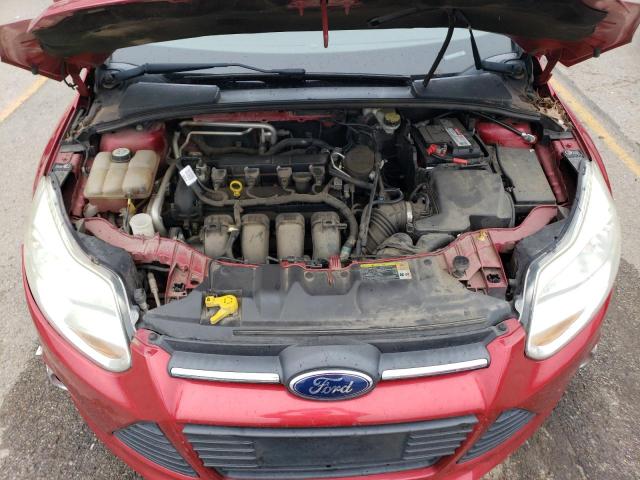 1FAHP3F23CL298321 - 2012 FORD FOCUS SE RED photo 11