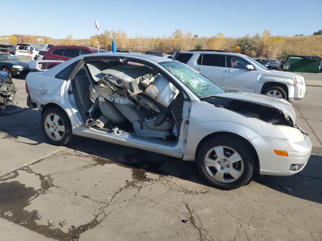 1FAHP34N77W129694 - 2007 FORD FOCUS ZX4 SILVER photo 4