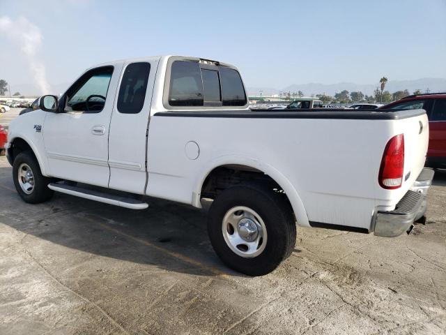 1FTRX18LXXKA58929 - 1999 FORD F150 WHITE photo 2