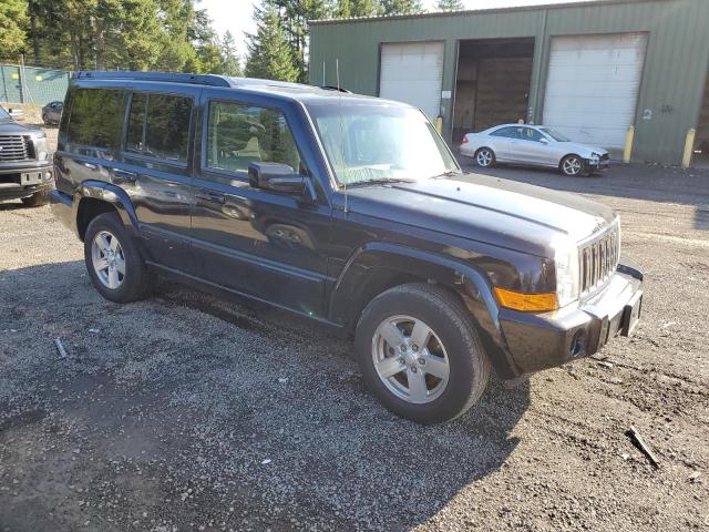 1J8HH48K57C574099 - 2007 JEEP COMMANDER BLACK photo 4