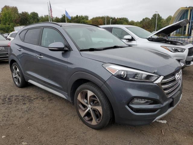 KM8J3CA21HU435414 - 2017 HYUNDAI TUCSON LIMITED GRAY photo 4