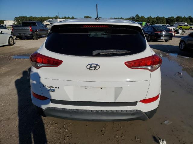 KM8J23A43HU508075 - 2017 HYUNDAI TUCSON SE WHITE photo 6