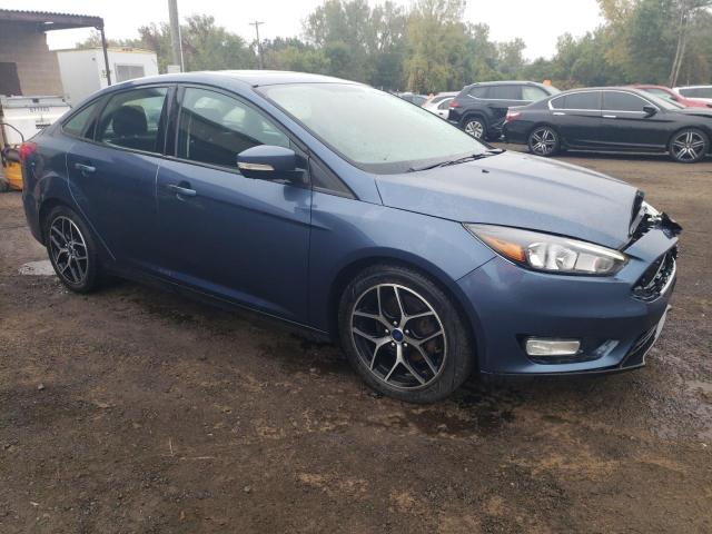 1FADP3H29JL254770 - 2018 FORD FOCUS SEL BLUE photo 4