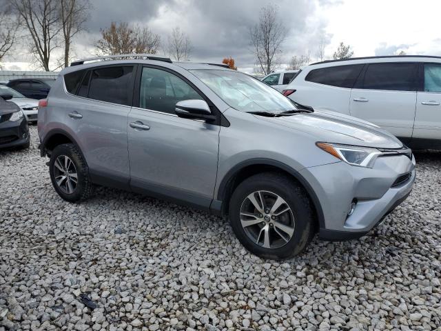 2T3WFREV8JW446086 - 2018 TOYOTA RAV4 ADVENTURE SILVER photo 4