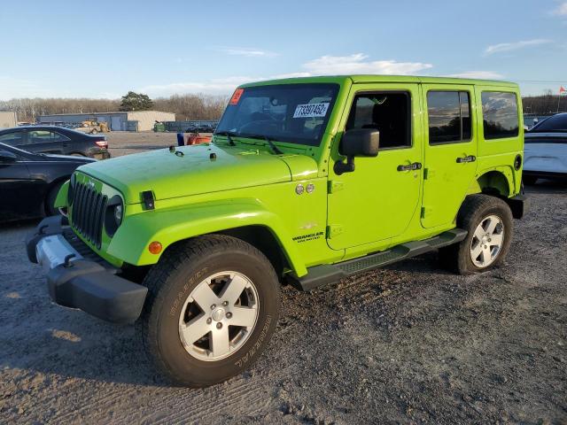 1C4BJWEG3CL232982 - 2012 JEEP WRANGLER U SAHARA GREEN photo 1