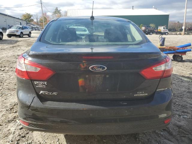 1FAHP3H22CL384295 - 2012 FORD FOCUS SEL BLACK photo 6