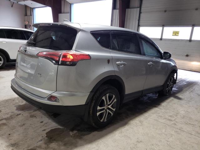 2T3BFREV8JW850178 - 2018 TOYOTA RAV4 LE SILVER photo 3