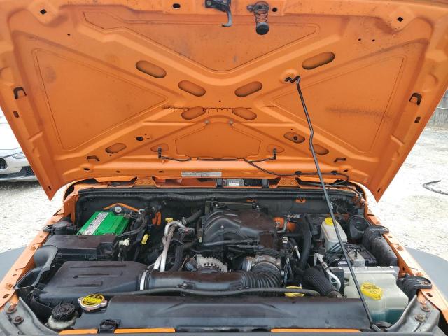 1C4HJWDG8DL520509 - 2013 JEEP WRANGLER U SPORT ORANGE photo 11