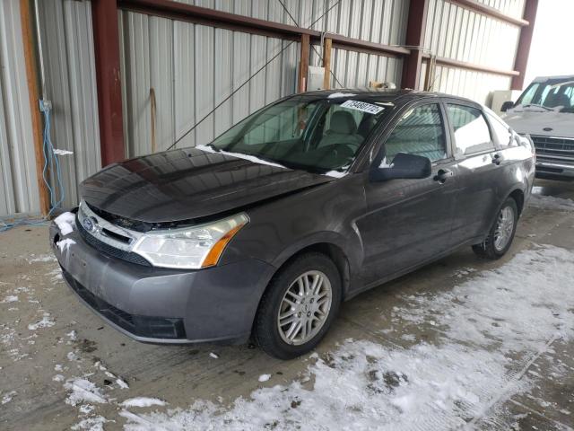 1FAHP3FN1AW277165 - 2010 FORD FOCUS 4D SE GRAY photo 1